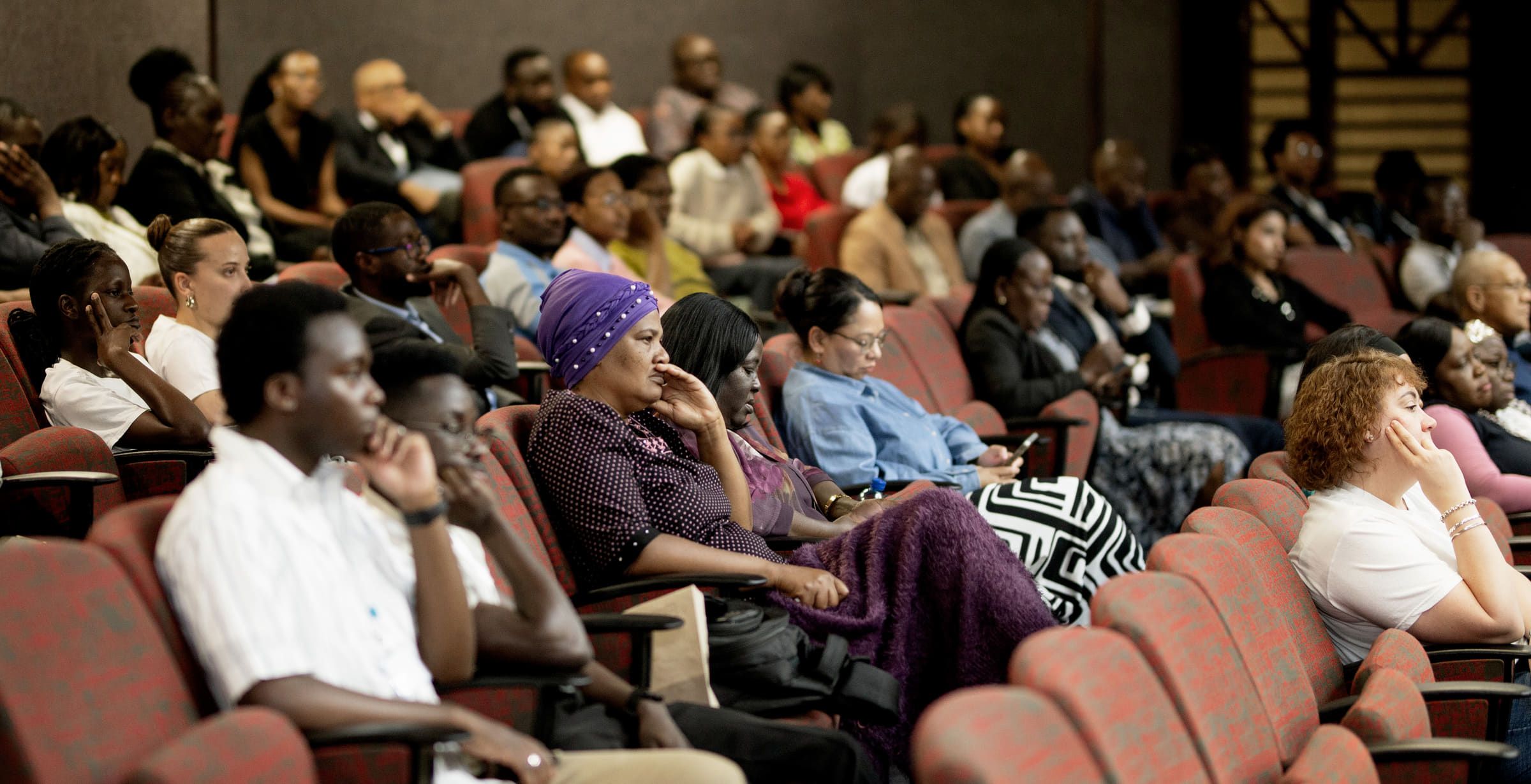 Delegates seated in an auditorium during an NMS scientific meeting.